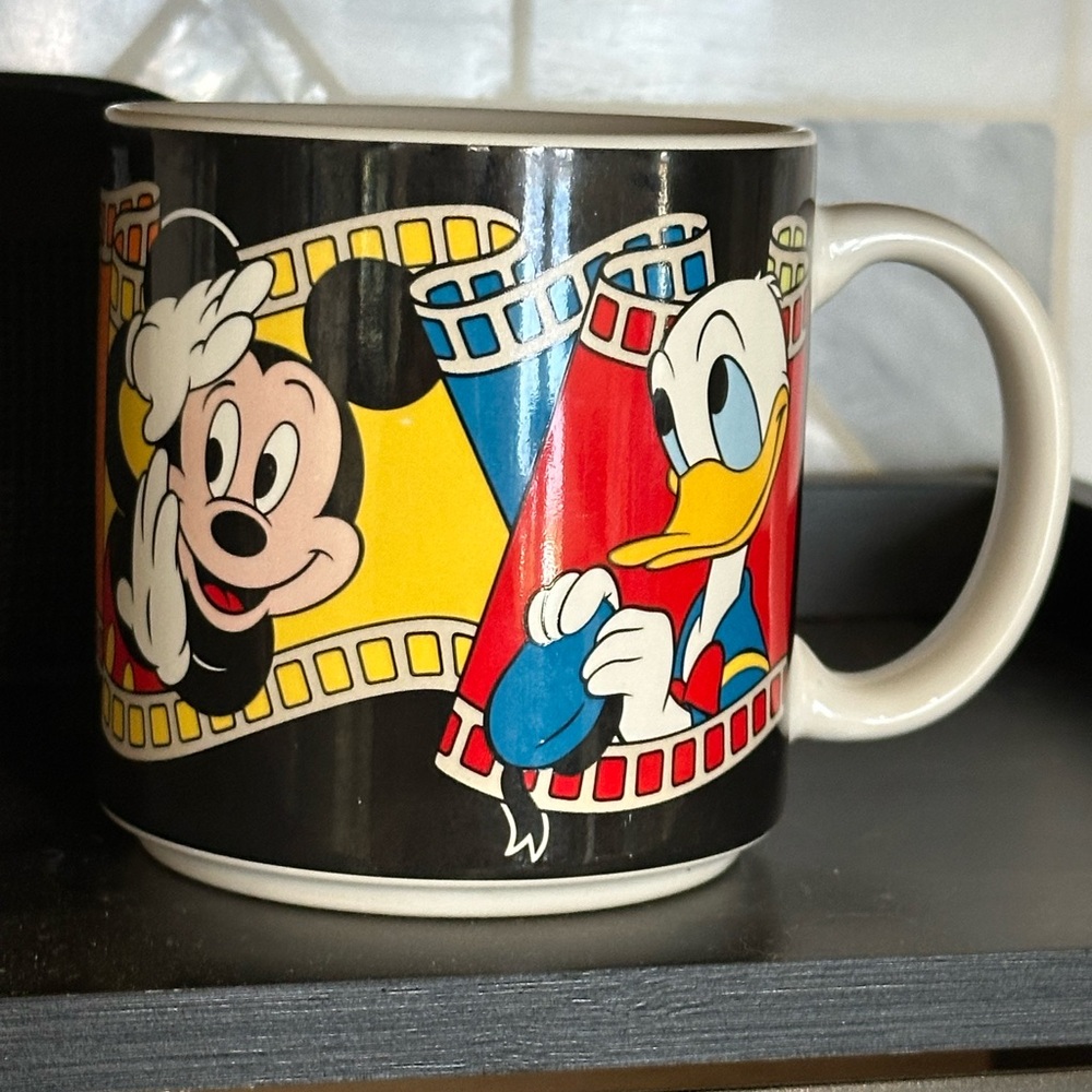 Vintage Disney "Filmstrip" ceramic coffee mug.